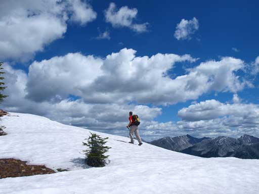Vern hiking up one of the few snow patches