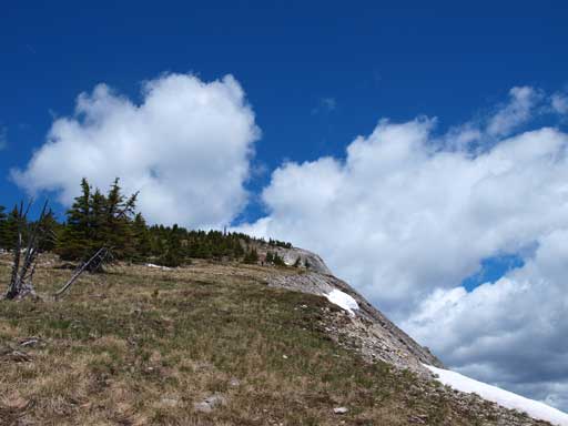 Slogging up grassy slope