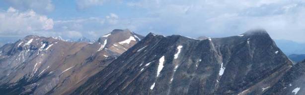A long shot of unnamed (left of center), and Mount Kinross (right)