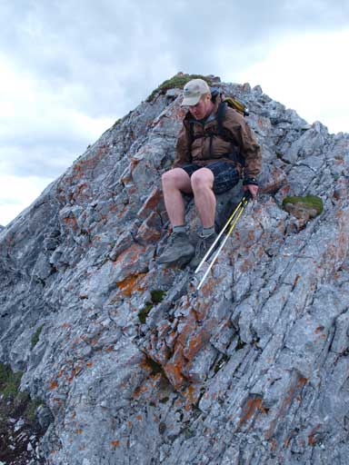 Neil getting down a loose step. What you don't see in this photo is the exposure of this step