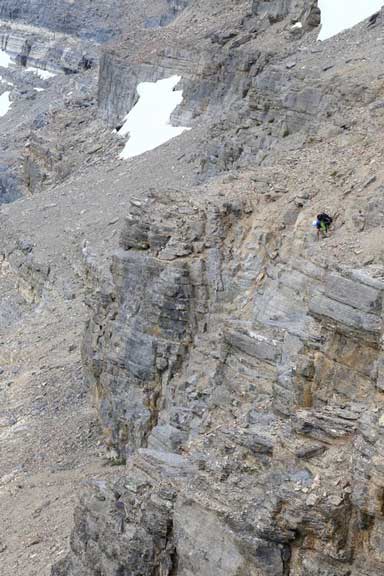 Me searching for a way down. Photo by Ben N