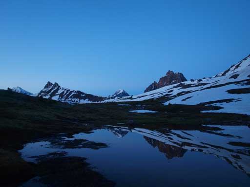 Oldhorn Mountain and its reflection in a tarn near Maccarib Pass