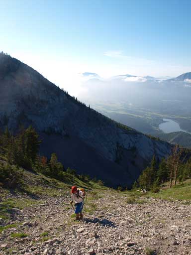 Dan slogging up tedious scree after exiting the steep slabby part