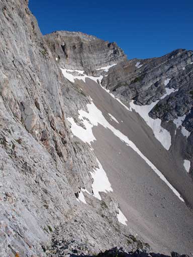 Here we spotted a scree ramp to short-cut the route to Tecumseh. Summit of Phillipps can be seen on this photo.