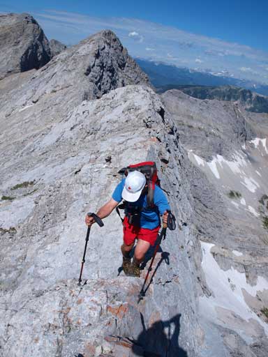 Grant walking across a short mildly exposed section