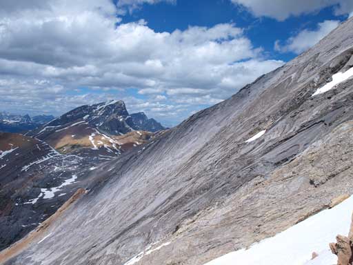 The scramble route goes up the face, but avoids these slabs