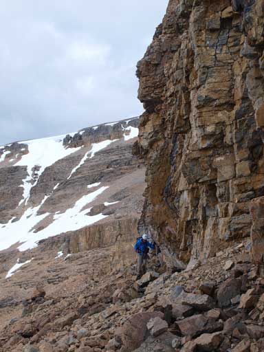Up a step, and then traverse climber's right most of the way back