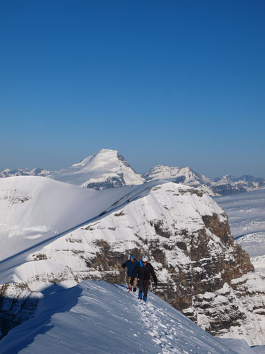 Ben and Ken coming up the last few steps, with Mount Columbia behind.