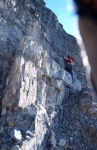 Mike ascending a difficult bit to break through one of the many minor cliff bands.