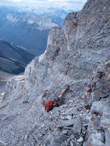 Mike finding a break through one of the many short cliff bands on the upper part.