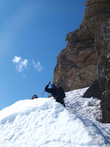 Going up the snow beneath the rock band