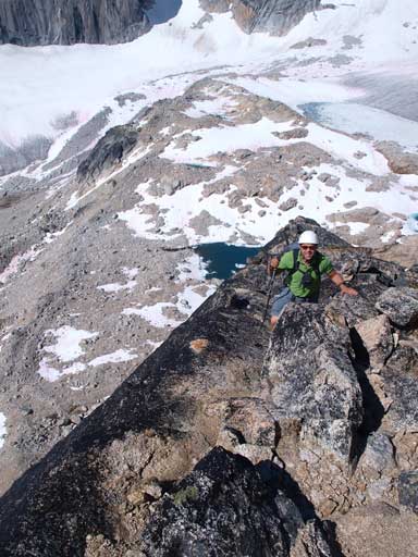 Eric scrambling up the typical terrain