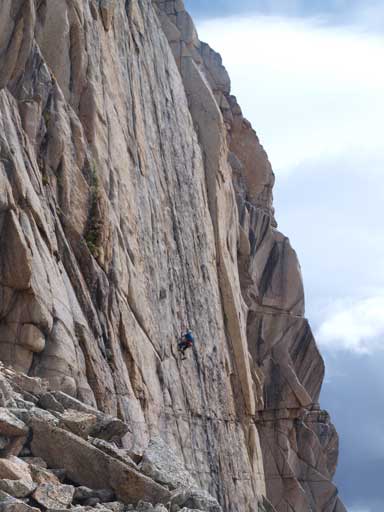 A solo climber raps off one of the many technical routes.