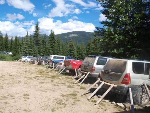 At parking lot. Note the cars with chicken wires