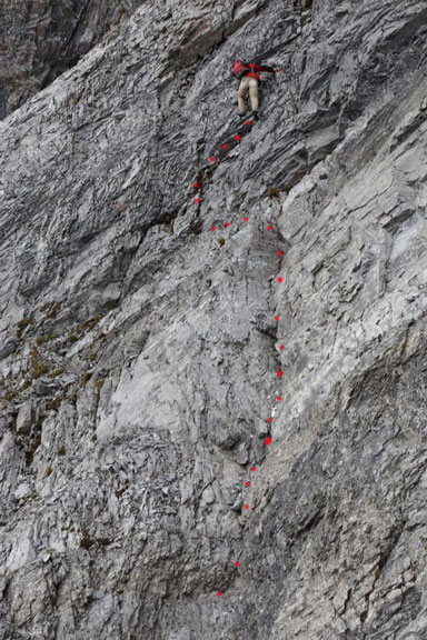 Me down-climbing our crux pitch. Photo by Ben N