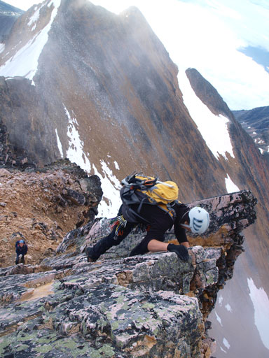 They let us pass eventually. I led up the 1st crux. This is one of these Calgarians climbing up.