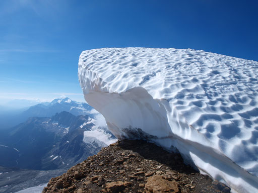 A big cornice on the false summit. We went around it on climber's left side
