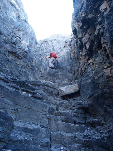 Down-climbing the difficult chimney/gully
