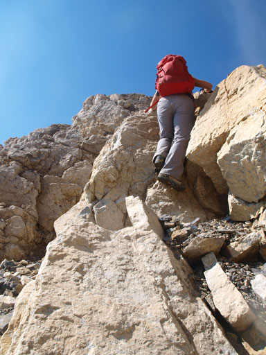 Down-climb the band above that snow slope
