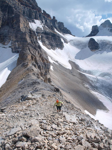 Dan trudging up Mount Strom. Assiniboine/Strom col below