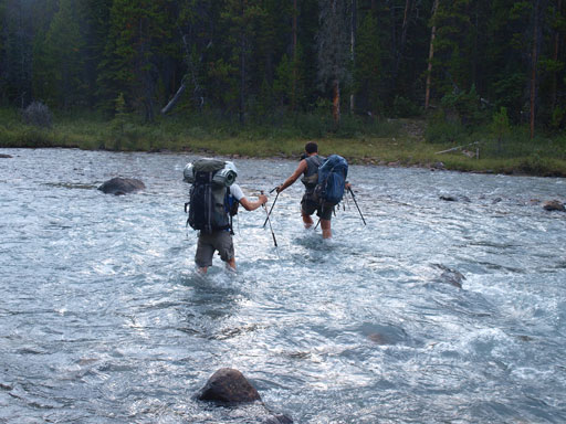 Crossing the thigh-deep Dolomite Creek back to the trail