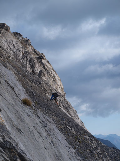 Scrambling up steep terrain to gain the high col