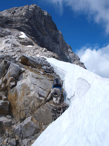 Down-climbing beside a snow scoop. The snow was rock hard so we couldn't use it