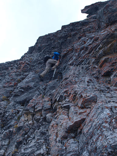 Down-climbing the first difficult pitch.