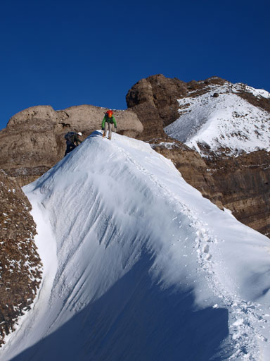 Descending the lower and wider snow arete