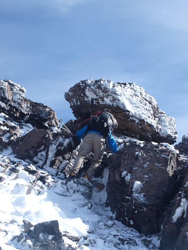 Ben down-climbing a short step