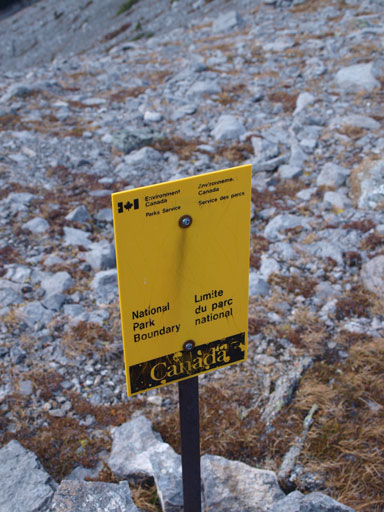The ridge crest is actually on the Park boundary. The summit is in the park, while the parking lot is outside.