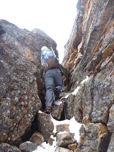 Scrambling up a chimney to get to Myosotis Lake