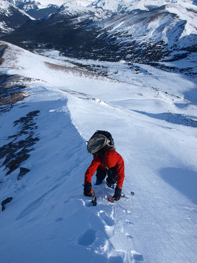 Ascending the snow ridge