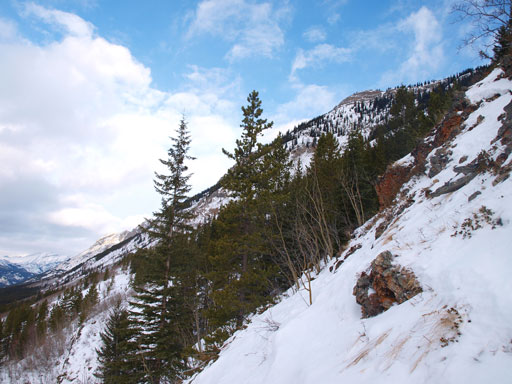 Steep, thin terrain at the lower slopes. I had to take the snowshoes off briefly