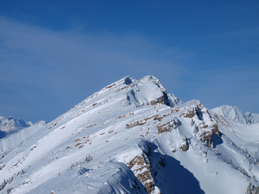 The true summit is on the far distance