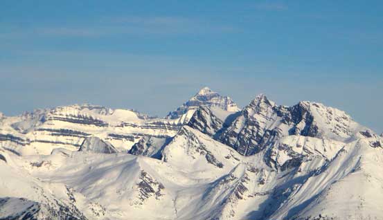 The big pyramid-shaped peak poking behind is Mt. Forbes