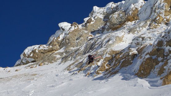 Ben traversing the awkward rock step