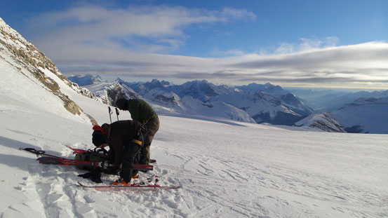 Strapping skis to our backpacks