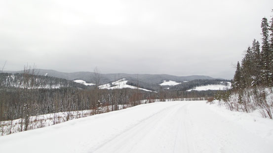 The summit is one of the bumps in the distance.