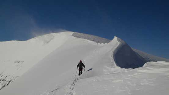 Going back along the summit ridge