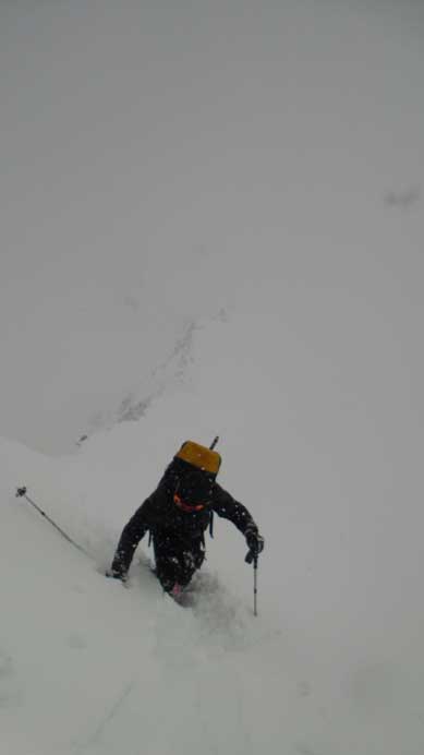 Ascending the steep lower ridge. Knee deep post-holing on snowshoes, certainly not step-kicking as described by other trip reports...