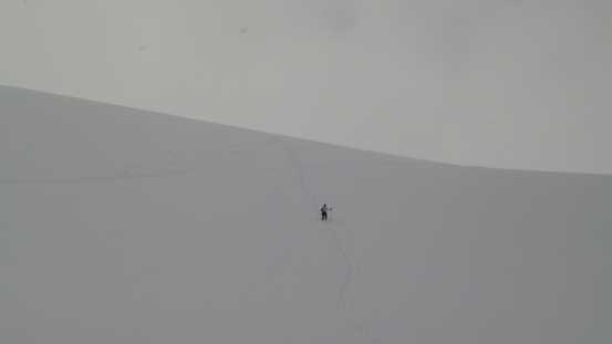 Snowshoeing down the glacier above Bow Hut
