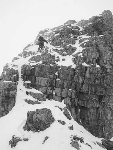 Me climbing up the difficult terrain, 1st rock step. Photo by Vern