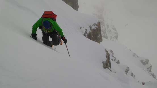 Vern climbing up steep snow. Typical terrain on and above the gullies. South facing, ridiculously steep and very exposed...