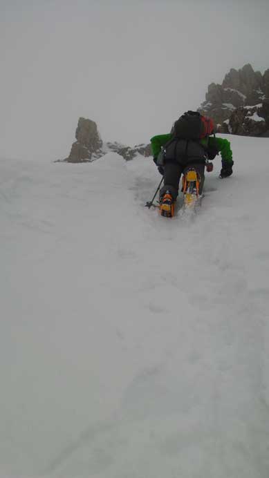 Vern down-climbing the gully. I was bombasted by snow balls.