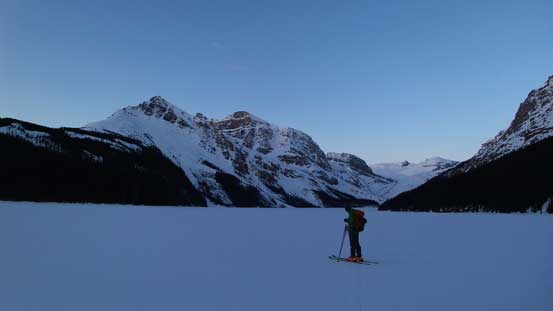 Vern skiing across Peyto Lake