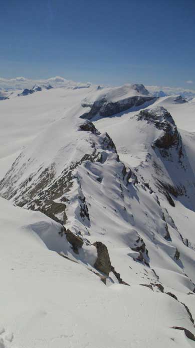 Looking down the ridge connecting to Tilly Peak. This is probably a scramble in summer but slabby, jagged and exposed. Might not be a good idea in winter