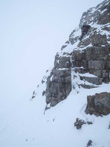 Me down-climbing the hardest part of the 1st step. Very slippery, loose and no hold, and very exposed and on ski boots... Photo by Vern