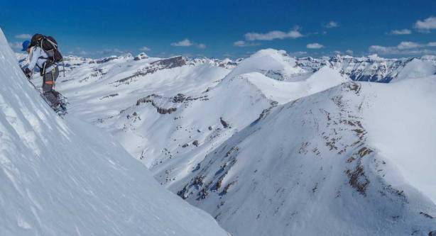 The only photo we took on the up-climb. We were speeding at the fastest we could. Here's me traversing climber's right to bypass a near vertical snow band. This traverse is extremely exposed.