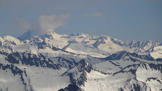 Some clouds obscuring Mt. Sir Sandford, the highest in Selkirks. Behind is Adamant Mountain